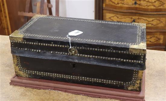 A late 18th / early 19th century brass studded leather covered camphorwood trunk